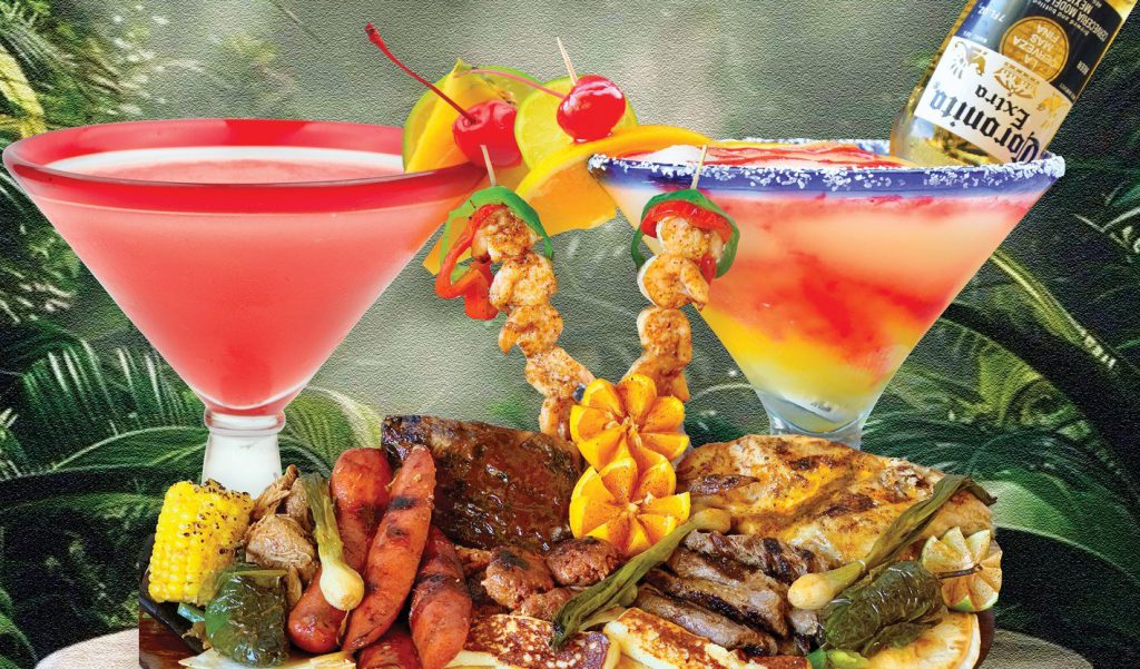 A Las Palmas grill platter with margaritas